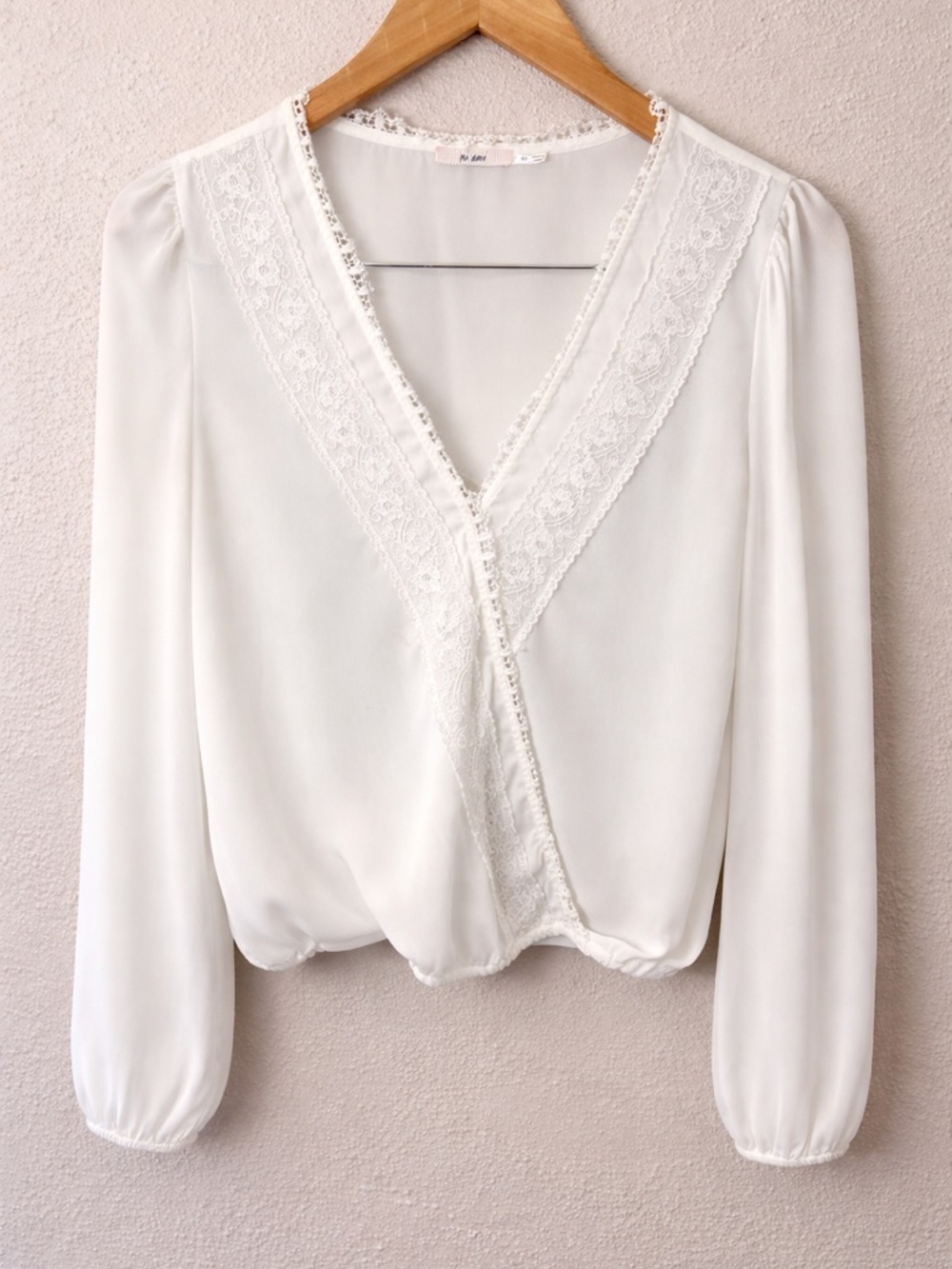 Francesca's Collections Ivory Lace-Trim Wrap Blouse